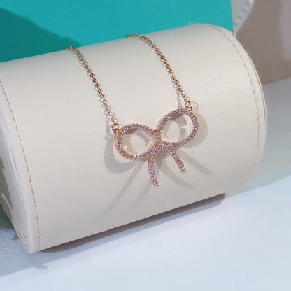 [Eterna Jewels]CLAW SET RHODIUM PLATED BOW NECKLACE