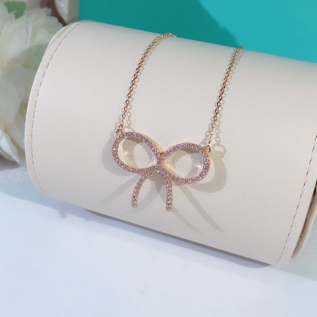 [Eterna Jewels]CLAW SET RHODIUM PLATED BOW NECKLACE
