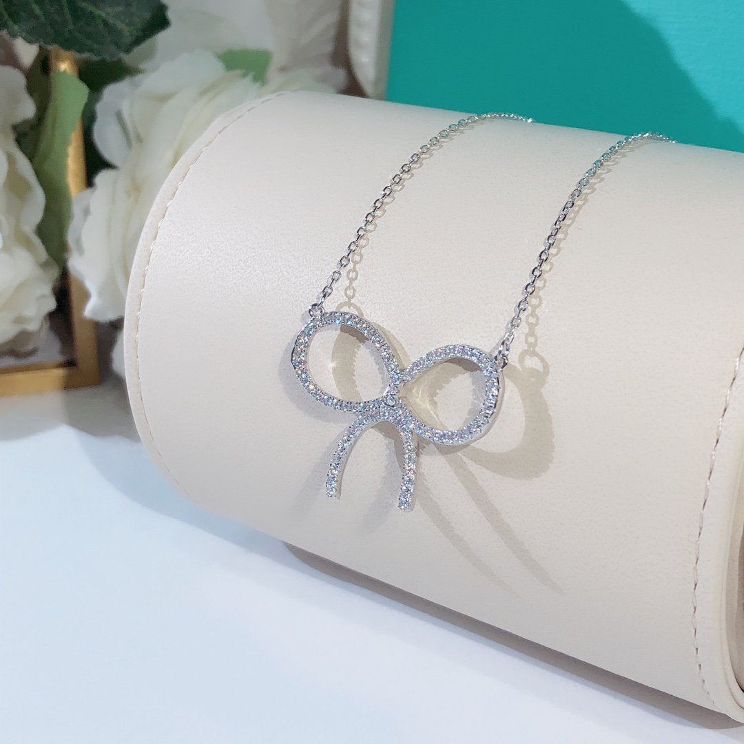 [Eterna Jewels]CLAW SET RHODIUM PLATED BOW NECKLACE