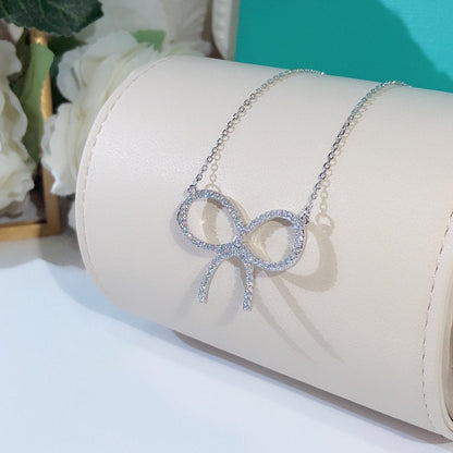 [Eterna Jewels]CLAW SET RHODIUM PLATED BOW NECKLACE